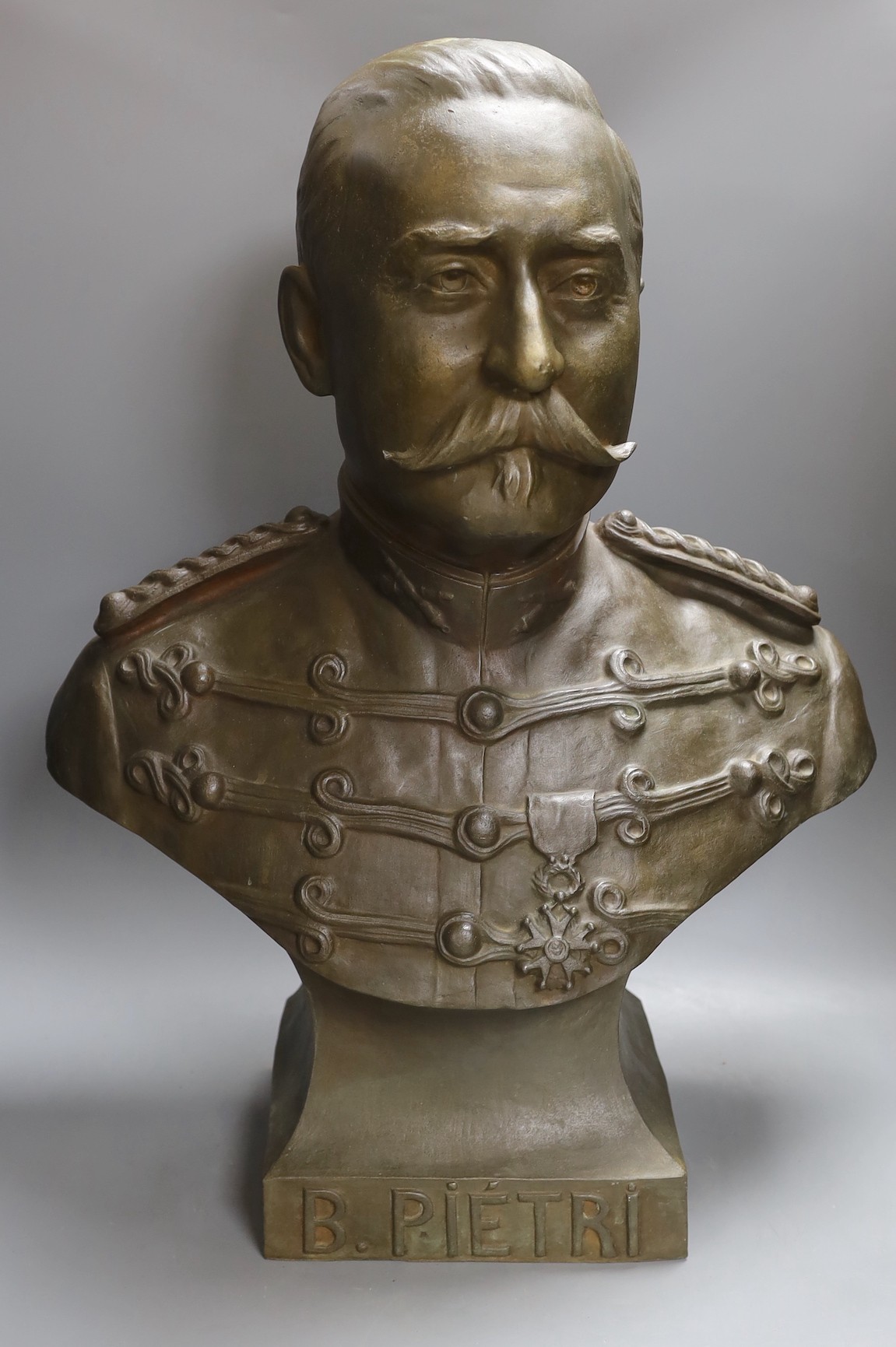 A bronze bust of B. Pietri, signed and dated 1910 - 62cm tall